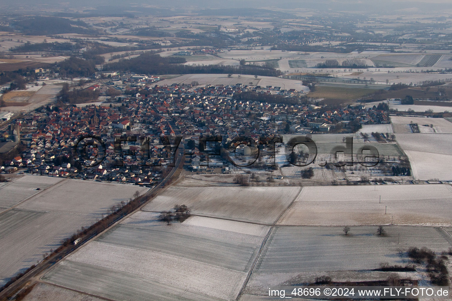 Aerial view of In winter from the west in the district Münzesheim in Kraichtal in the state Baden-Wuerttemberg, Germany