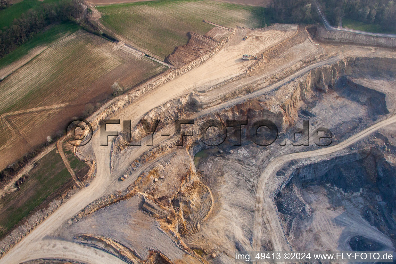 Limestone mining in the Nussloch quarry in the district Baiertal in Wiesloch in the state Baden-Wuerttemberg, Germany