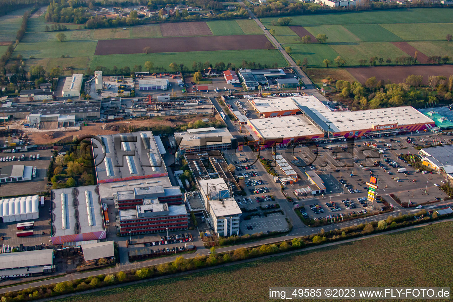 Bruchwiesenstrasse industrial area with Hornbach hardware store in the district Dreihof in Bornheim in the state Rhineland-Palatinate, Germany from above