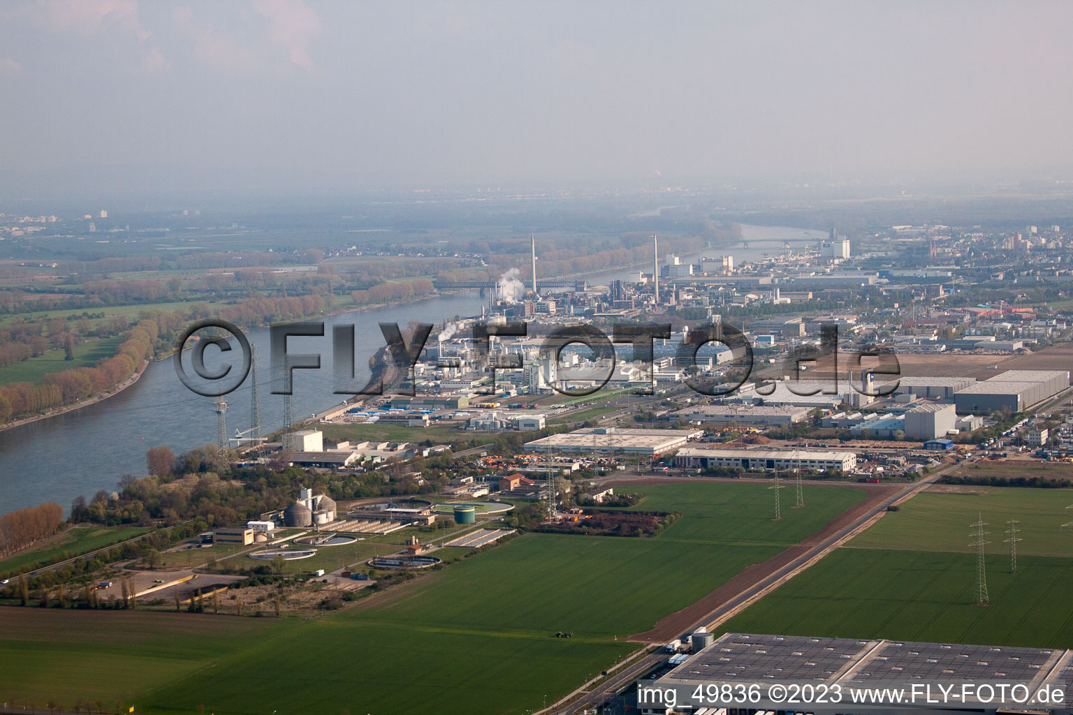 North industrial area on the Rhine in Worms in the state Rhineland-Palatinate, Germany seen from above