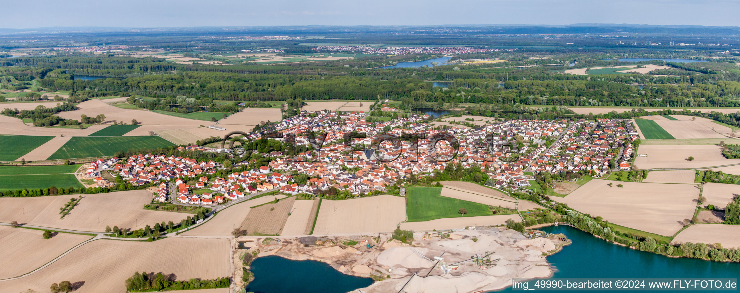 Panoramic perspective Town View of the streets and houses of the residential areas in Leimersheim in the state Rhineland-Palatinate, Germany