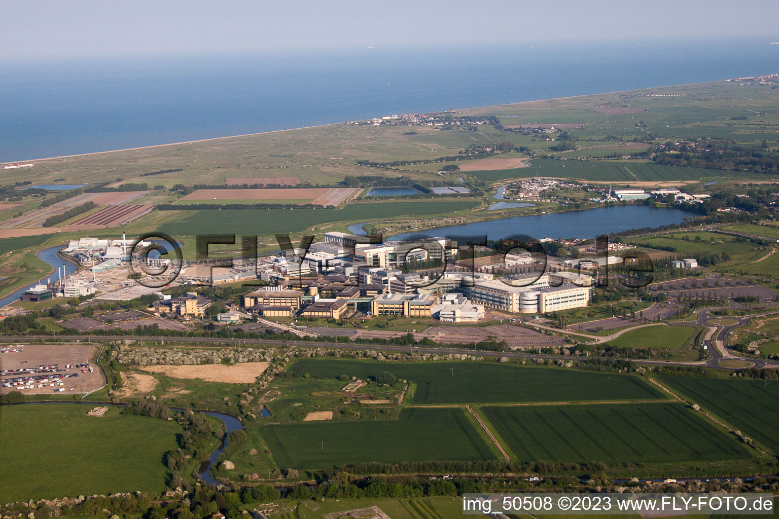 Aerial view of Building and production halls on the premises of the chemical manufacturers Pfizer Ltd and Discovery Park in Sandwich in England, United Kingdom