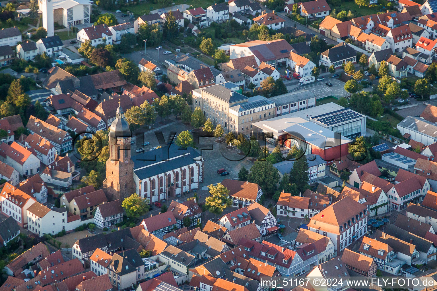 Church building in of Sankt Georgskirche, town-hall and primary school in Old Town- center of downtown in Kandel in the state Rhineland-Palatinate, Germany