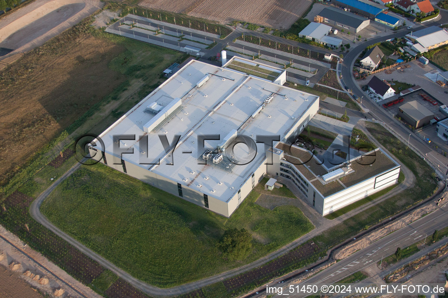 Oblique view of North commercial area, new DBK building in Rülzheim in the state Rhineland-Palatinate, Germany