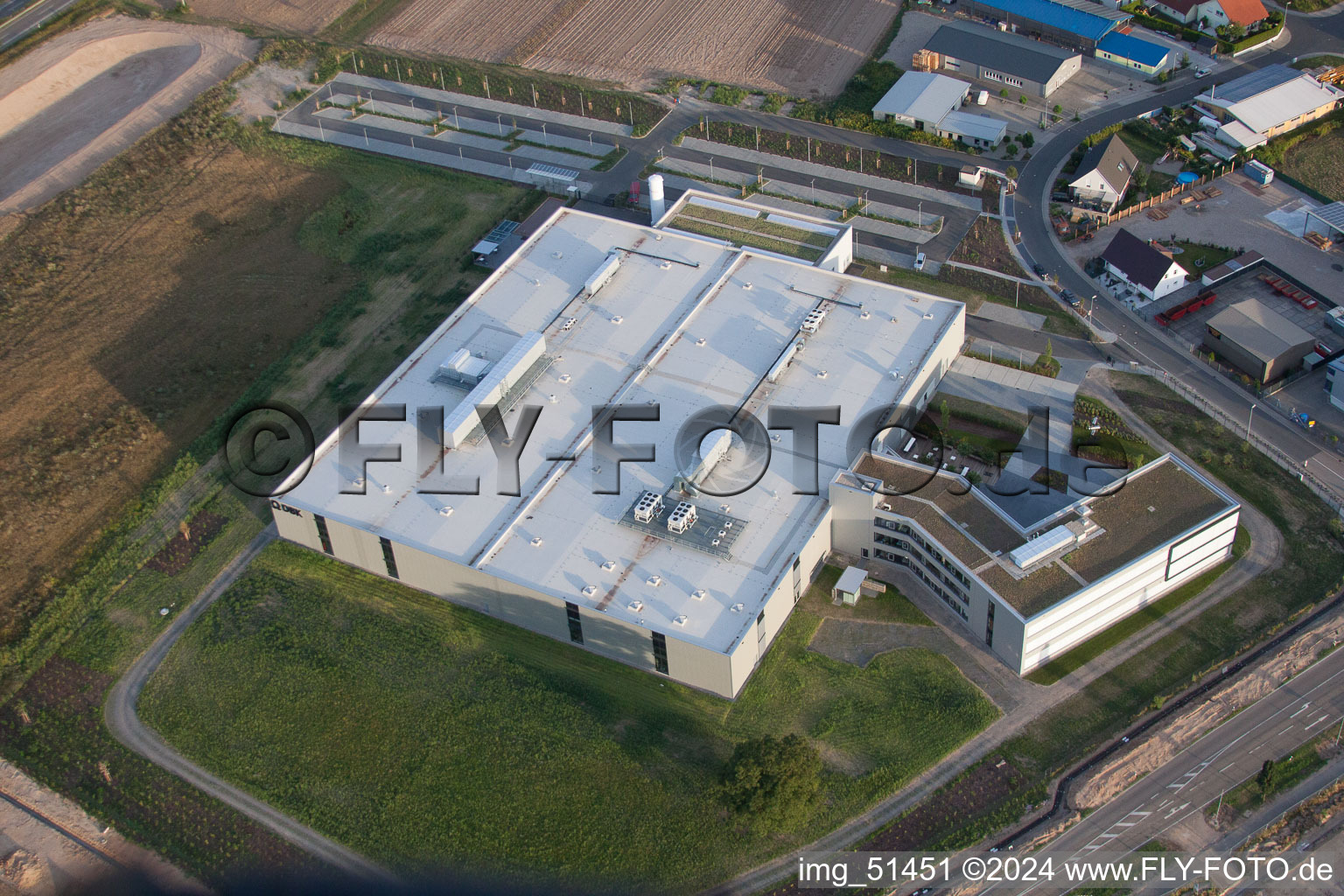 Commercial area north, DBK new building in Rülzheim in the state Rhineland-Palatinate, Germany from above