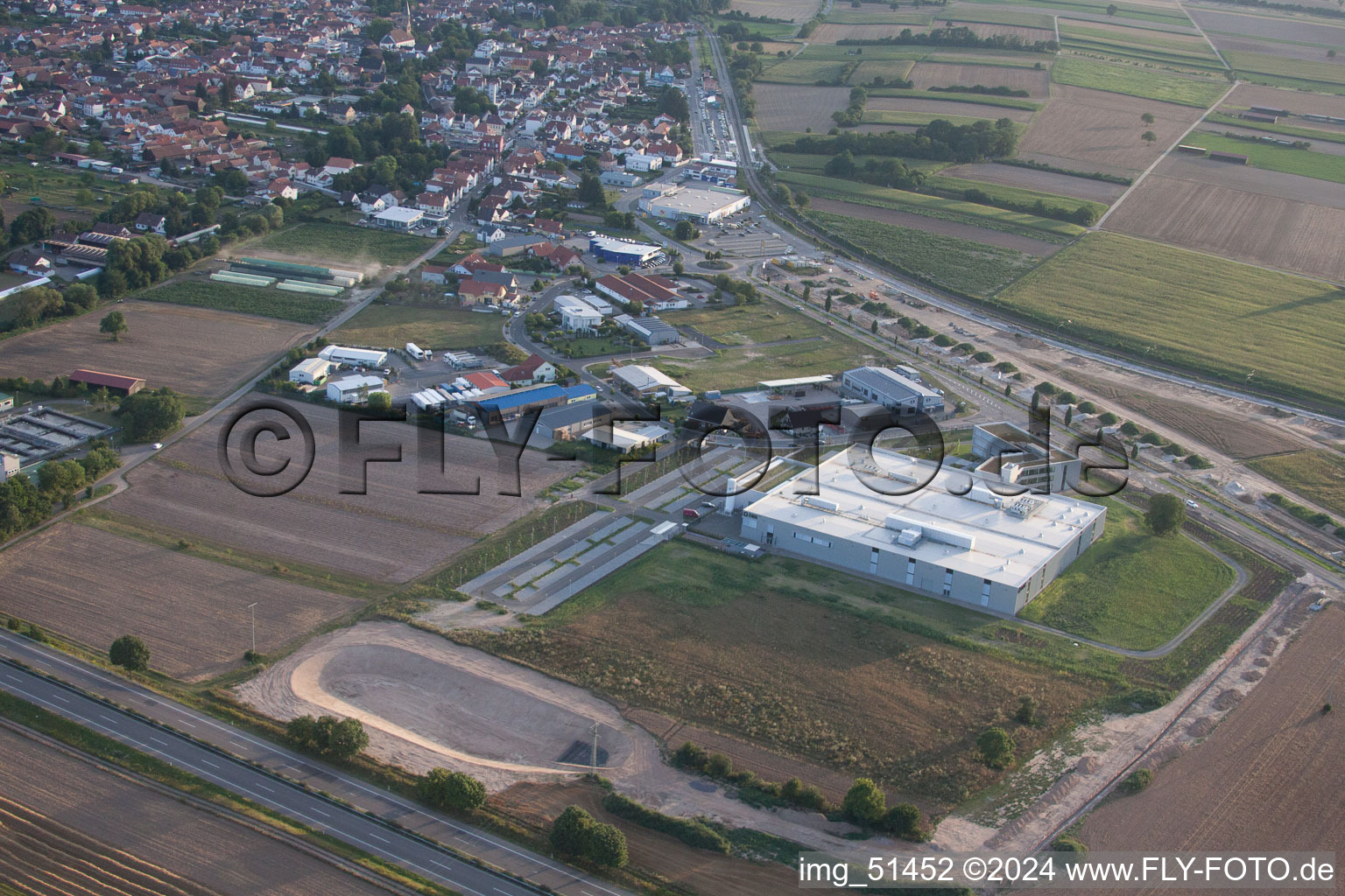 Commercial area north, DBK new building in Rülzheim in the state Rhineland-Palatinate, Germany out of the air