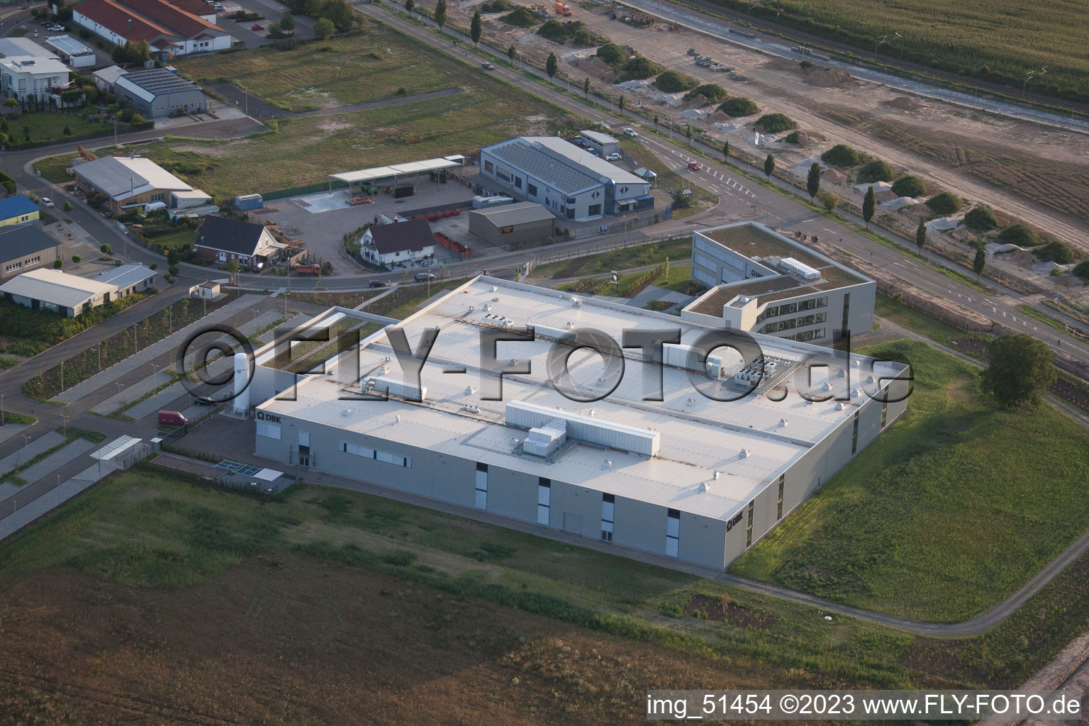 North commercial area, new DBK building in Rülzheim in the state Rhineland-Palatinate, Germany seen from above