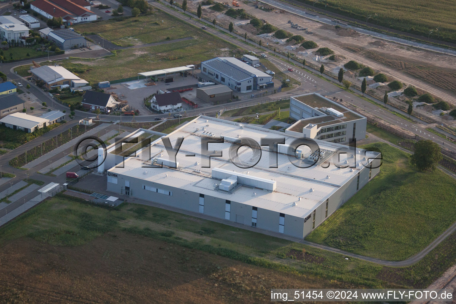 Commercial area north, DBK new building in Rülzheim in the state Rhineland-Palatinate, Germany seen from above