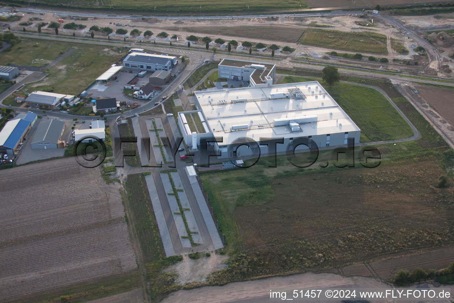 North commercial area, new DBK building in Rülzheim in the state Rhineland-Palatinate, Germany viewn from the air