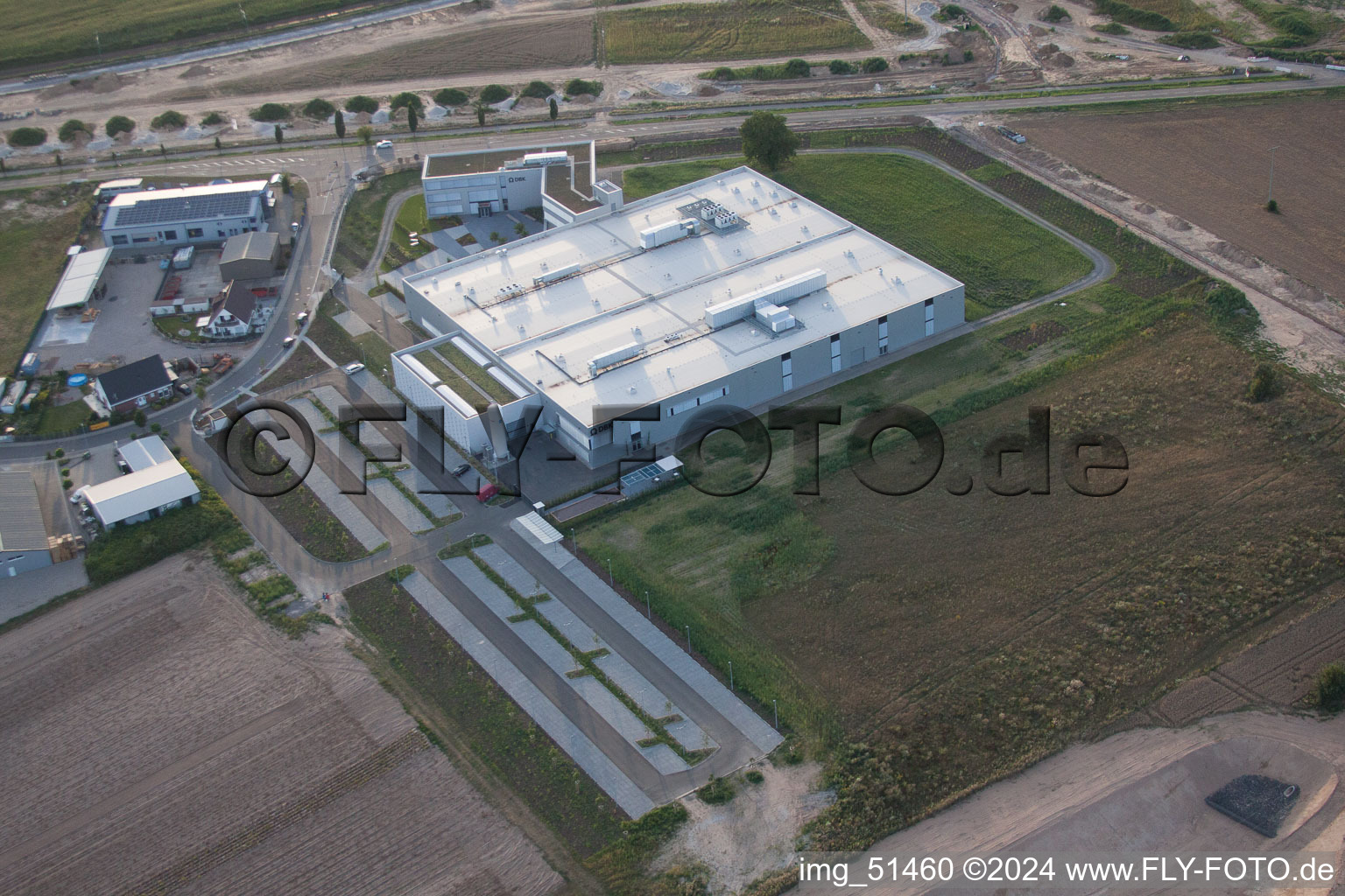 Commercial area north, DBK new building in Rülzheim in the state Rhineland-Palatinate, Germany from the drone perspective