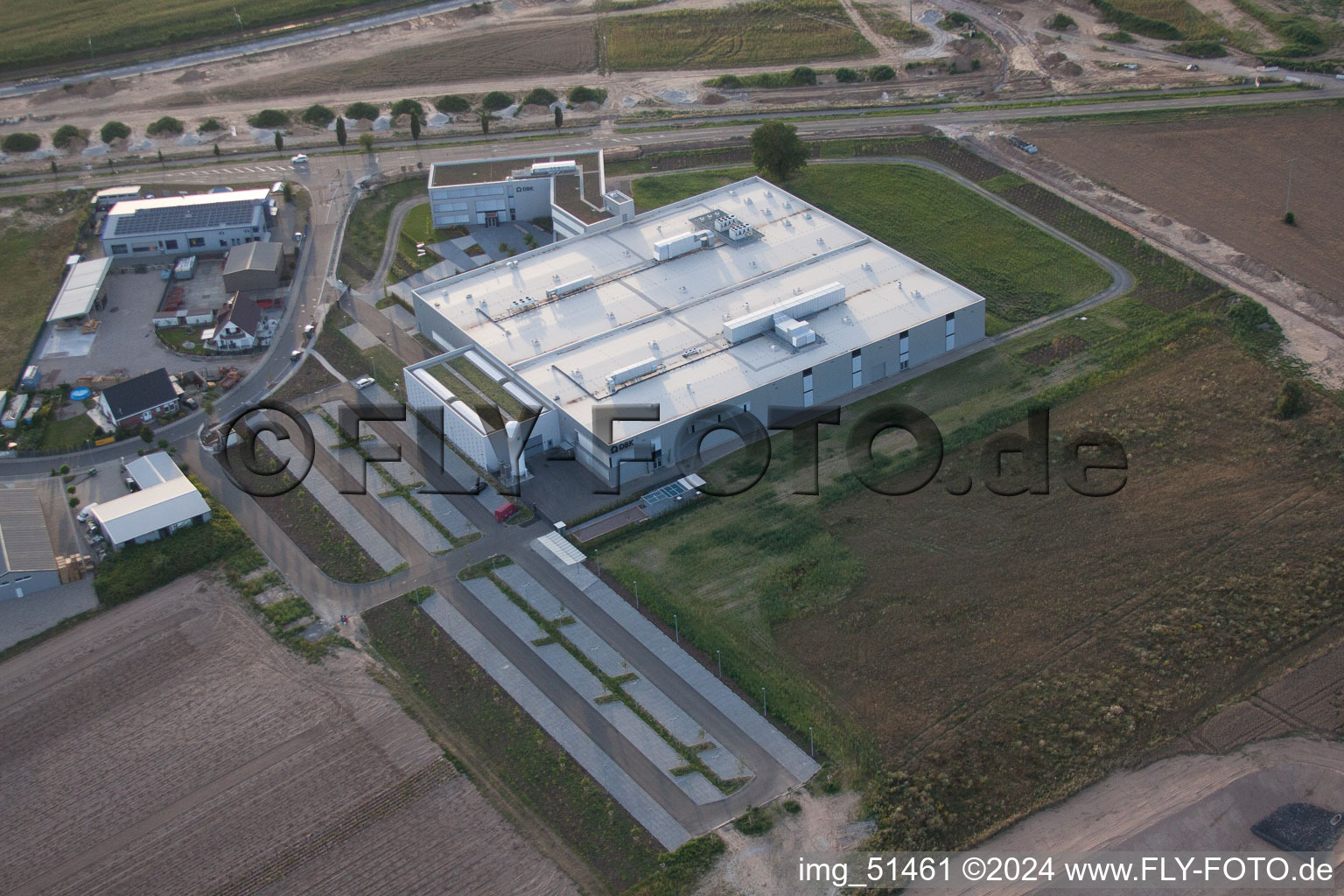 Commercial area north, DBK new building in Rülzheim in the state Rhineland-Palatinate, Germany from a drone