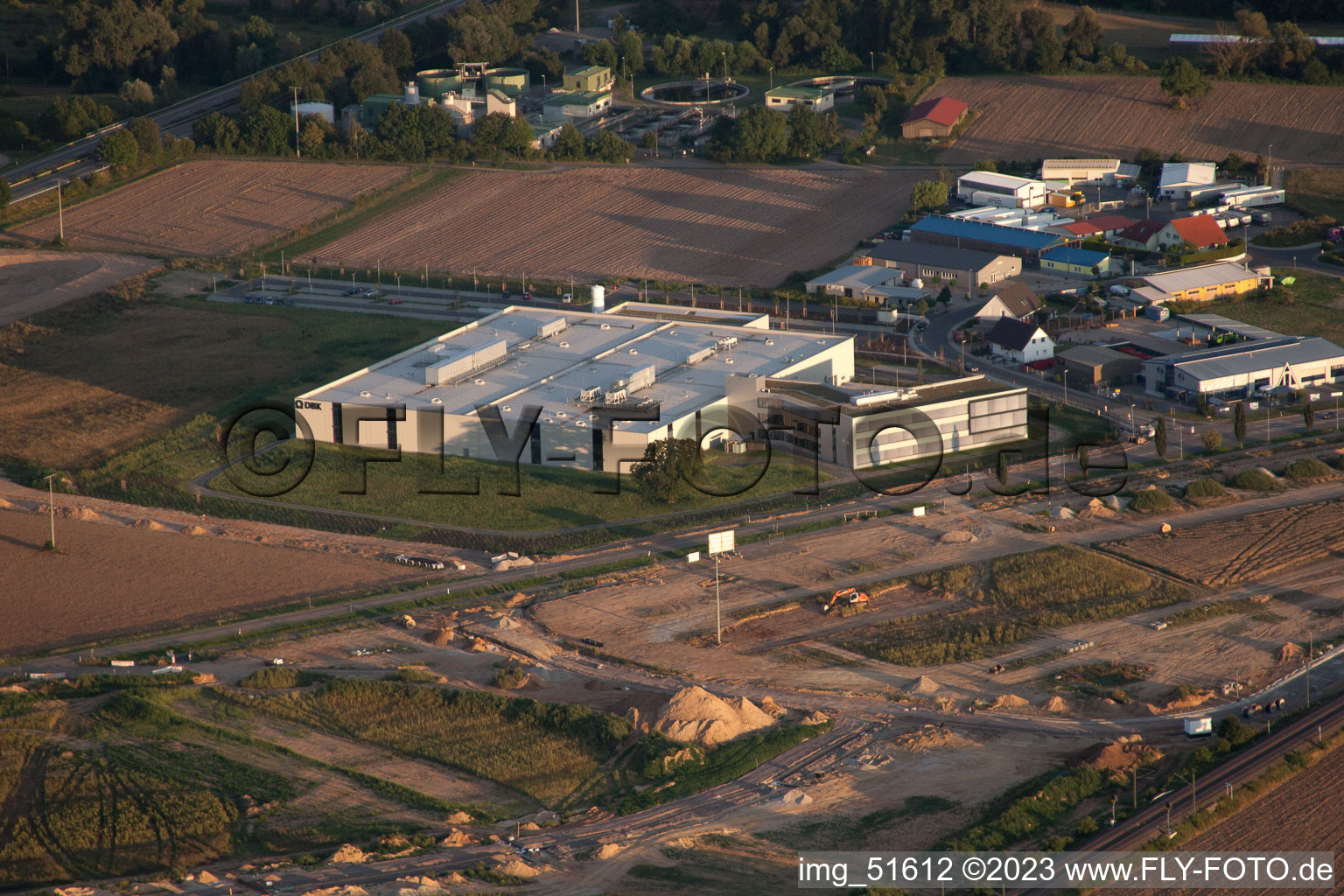 North commercial area, new DBK building in Rülzheim in the state Rhineland-Palatinate, Germany seen from a drone