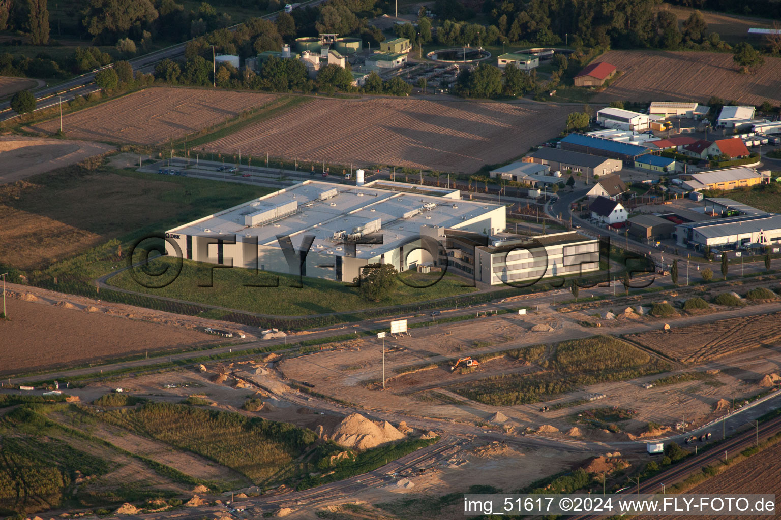 Commercial area north, DBK new building in Rülzheim in the state Rhineland-Palatinate, Germany from above