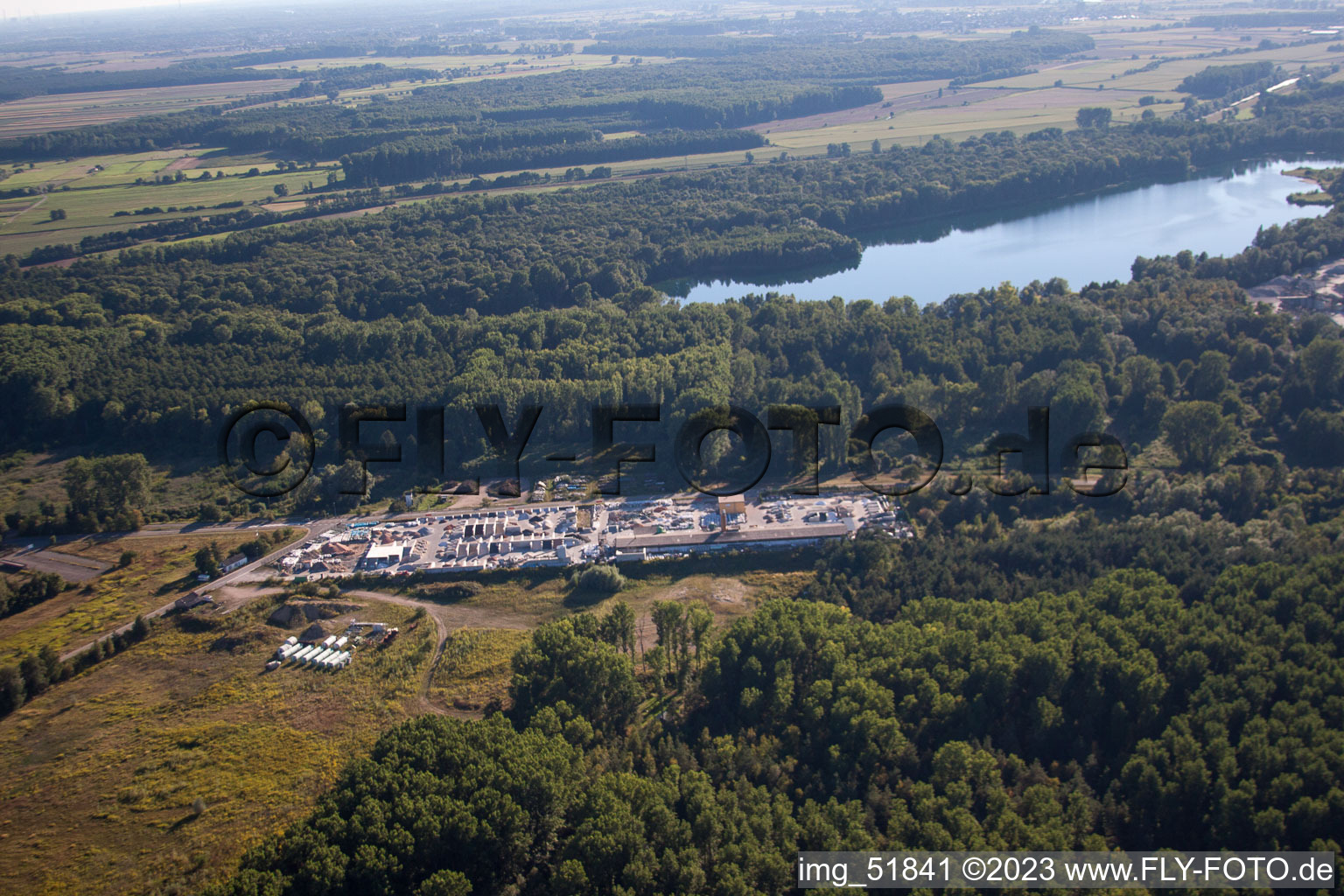 Garden gravel company, Badische Terrazzo Handelsgesellschaft mbH Huttenheimer Landstrasse 2-6 in the district Neudorf in Graben-Neudorf in the state Baden-Wuerttemberg, Germany seen from a drone