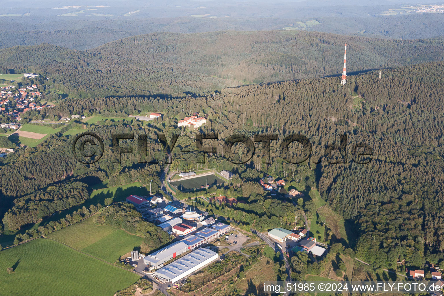 Industrial estate and company settlement with Morton Extrusionstechnik GmbH zu Fuessen des Sendemast in Abtsteinach in the state Hesse, Germany