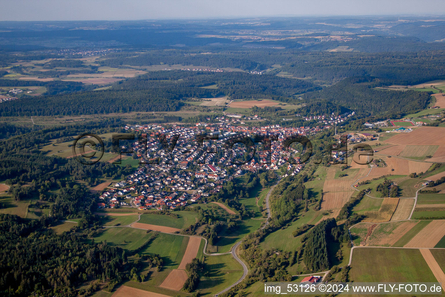 Village - view on the edge of agricultural fields and farmland in Haiterbach in the state Baden-Wurttemberg, Germany