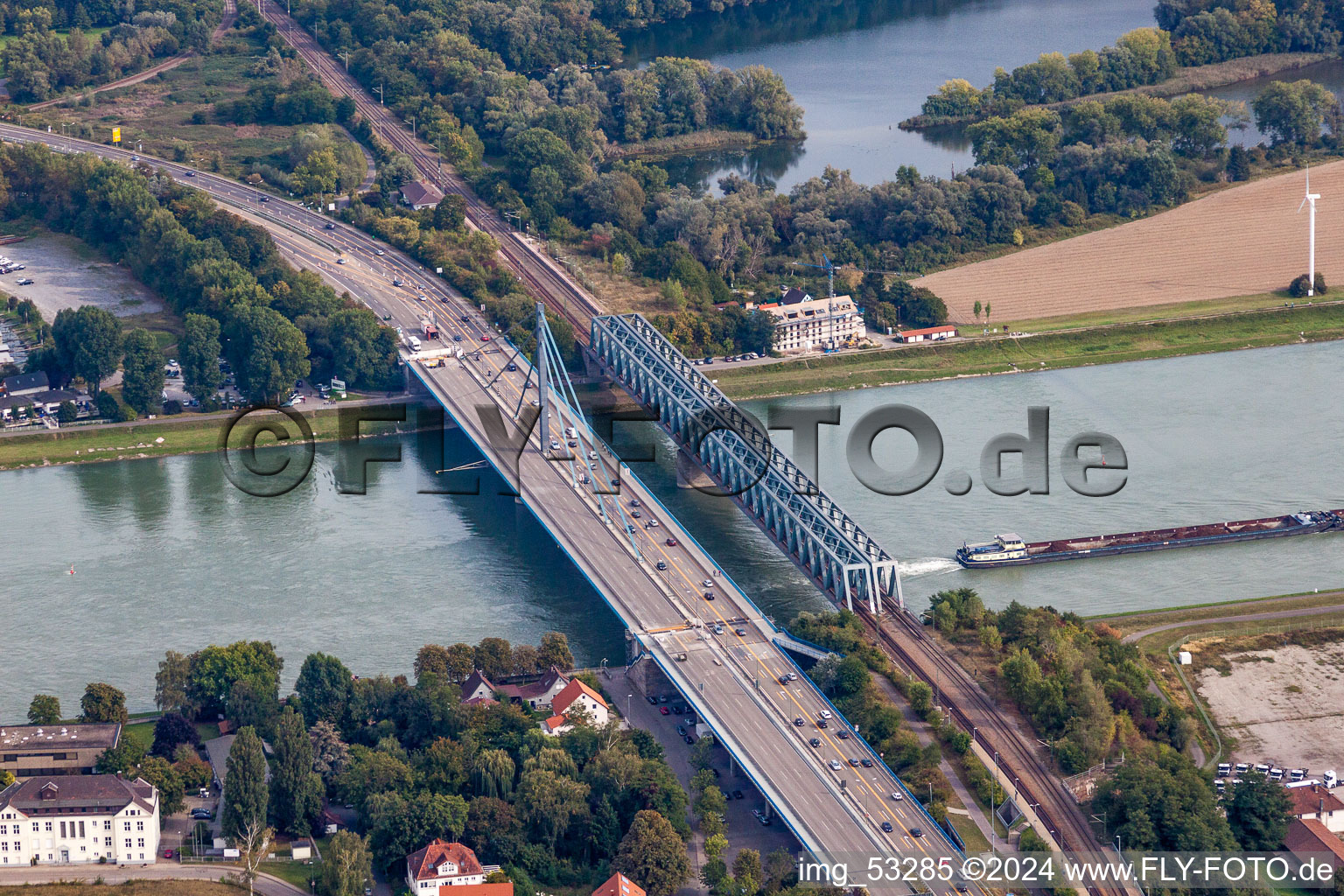 Rail and Street bridges construction across the Rhine river between Karlsruhe and Woerth am Rhein in the state Rhineland-Palatinate, Germany seen from above