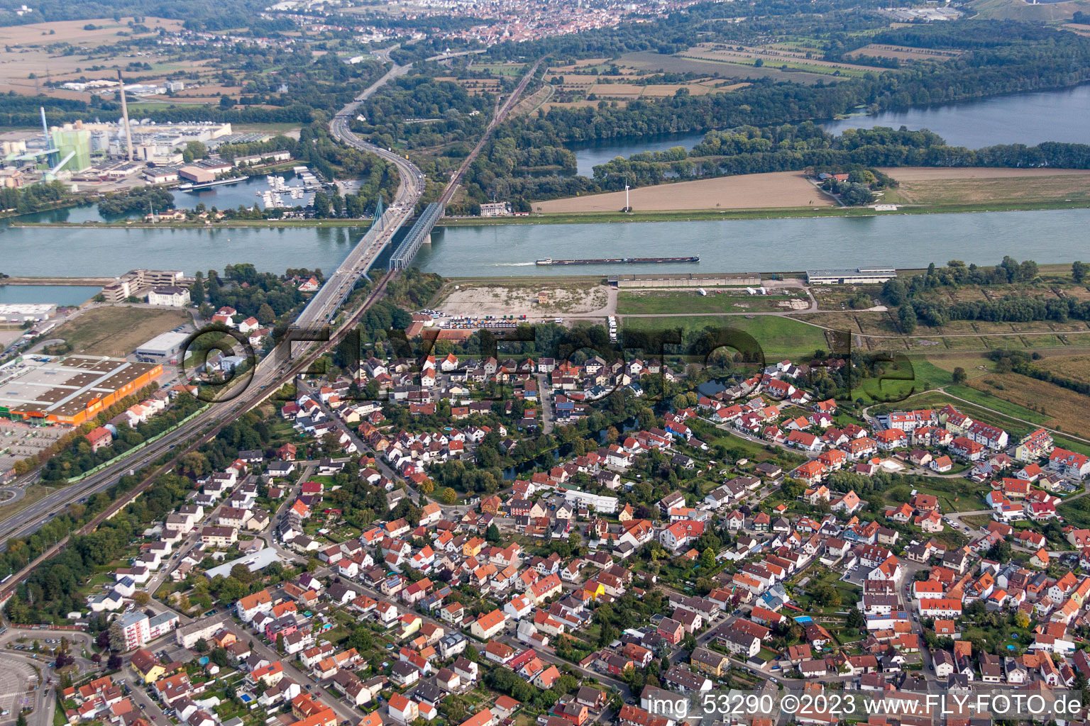 Rail and Street bridges construction across the Rhine river between Karlsruhe and Woerth am Rhein in the state Rhineland-Palatinate, Germany seen from above