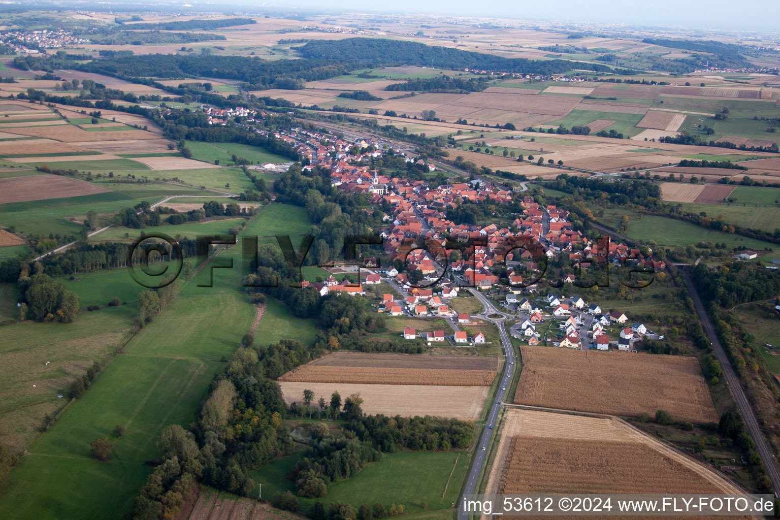 Village - view on the edge of agricultural fields and farmland in Obermodern in Grand Est, France