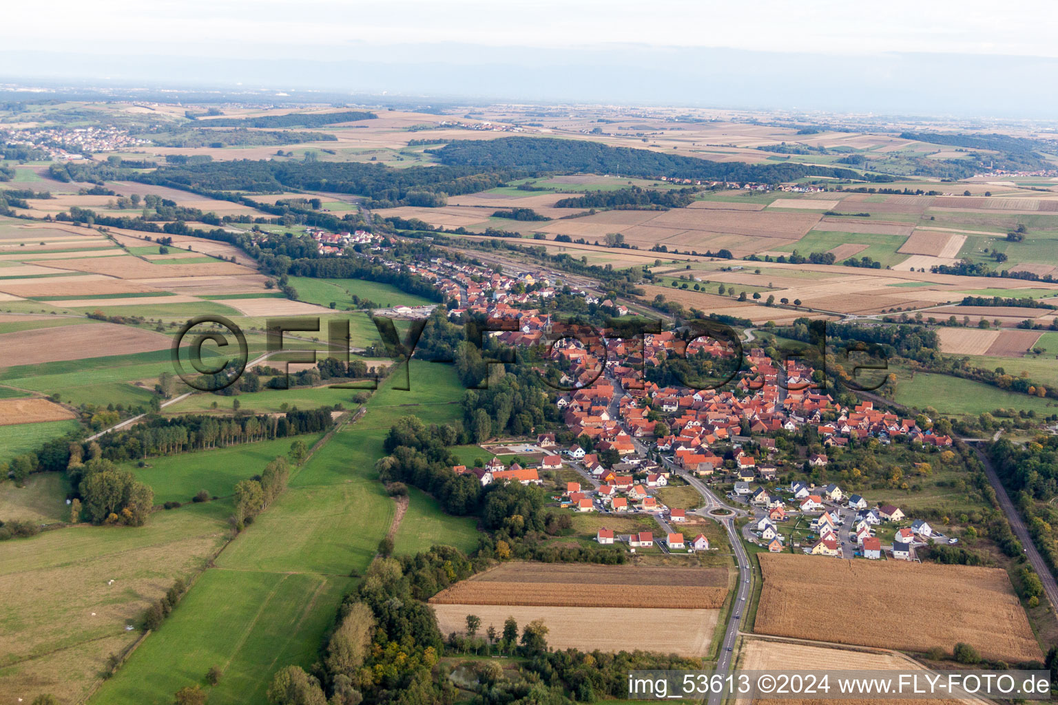 Village - view on the edge of agricultural fields and farmland in Menchhoffen in Grand Est, France