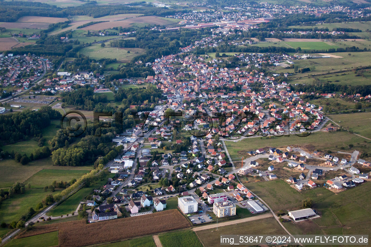 Village - view on the edge of agricultural fields and farmland in Gundershoffen in Grand Est, France