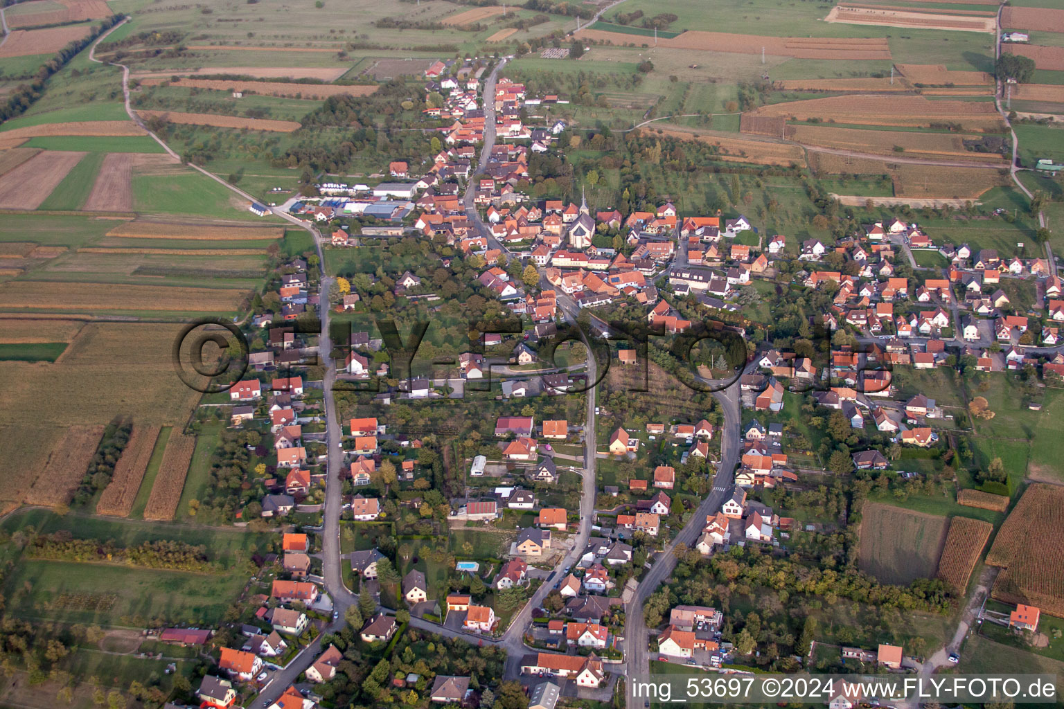 Oblique view of Village - view on the edge of agricultural fields and farmland in Gunstett in Grand Est, France