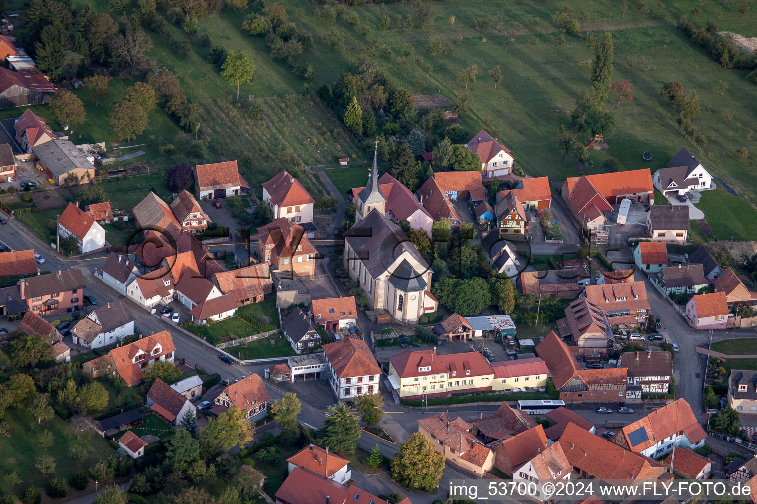 Village - view on the edge of agricultural fields and farmland in Gunstett in Grand Est, France from above