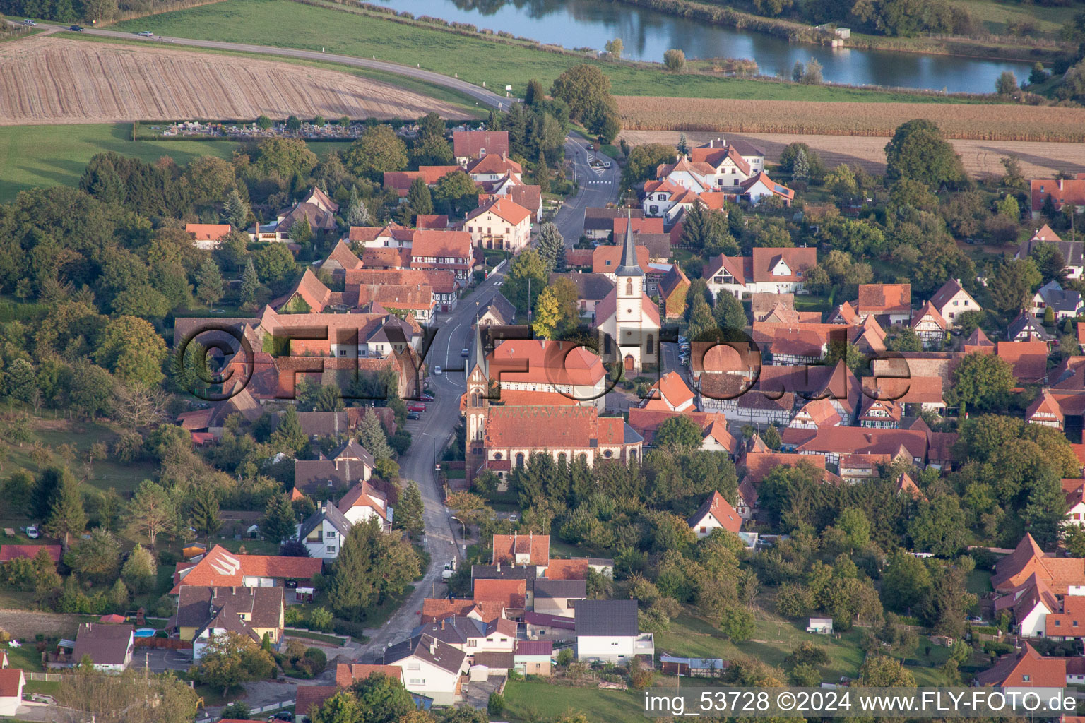 Aerial view of Church building in the village of in Kutzenhausen in Grand Est, France