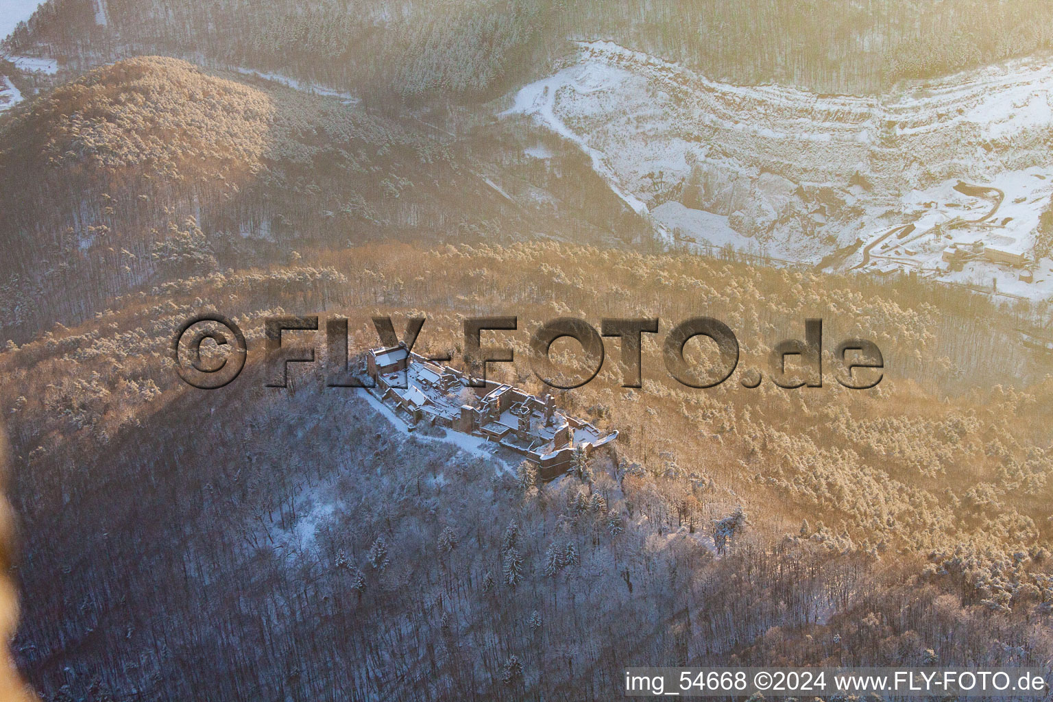 Madenburg castle ruins in winter with snow in Eschbach in the state Rhineland-Palatinate, Germany