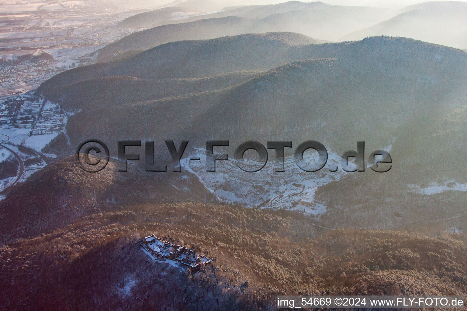 Aerial view of Madenburg castle ruins in winter with snow in Eschbach in the state Rhineland-Palatinate, Germany