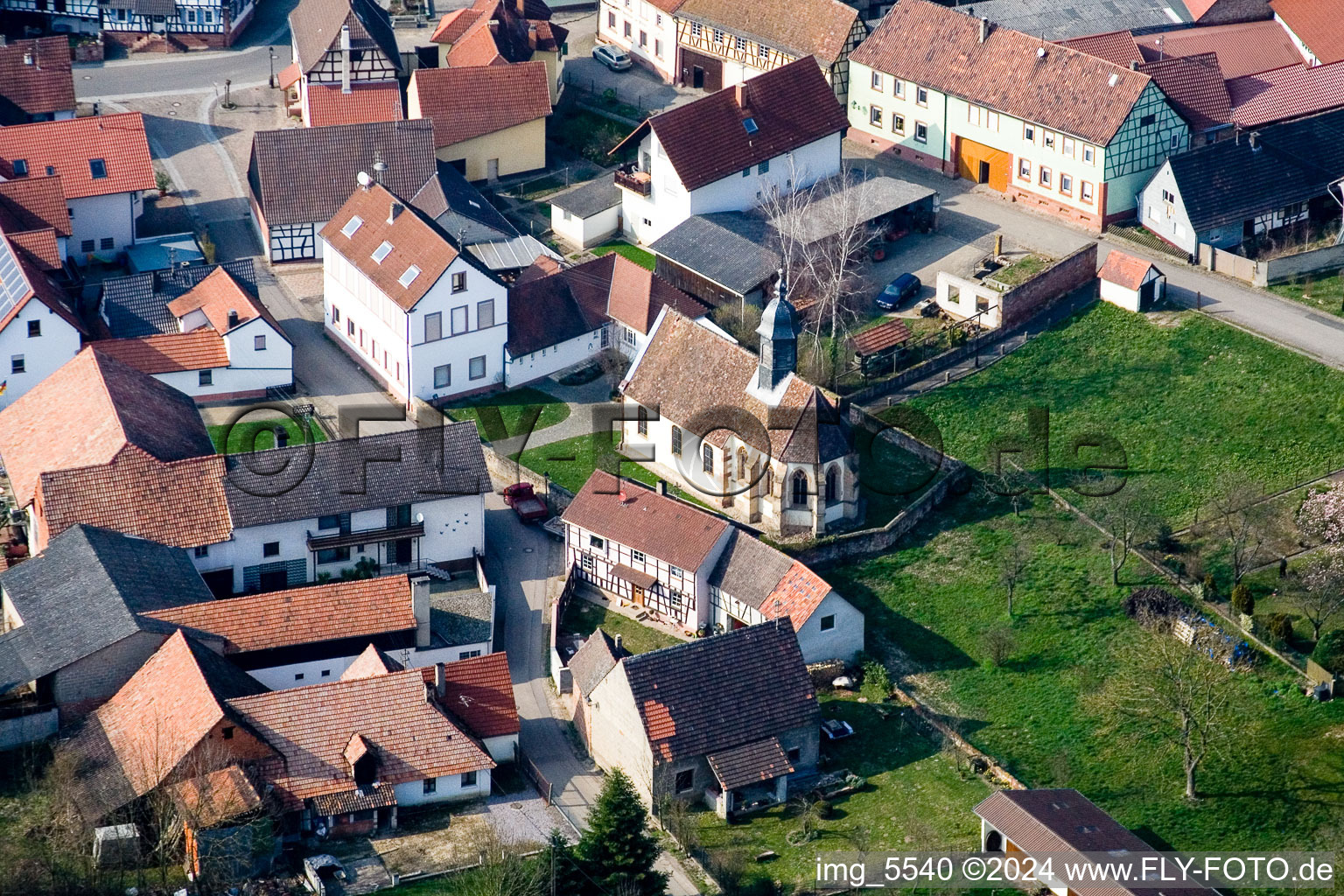 Aerial view of Church building in the village of in Dierbach in the state Rhineland-Palatinate