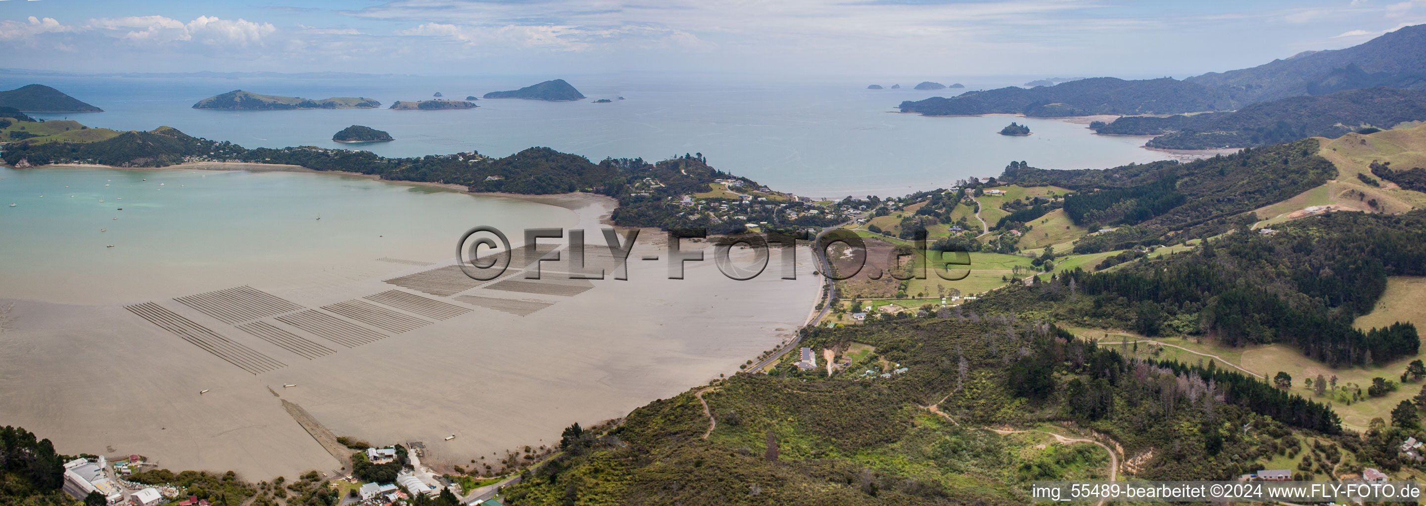 Aerial view of Coastline on the sandy beach of Sued-Pazifik in the district Mcgreogor Bay in Coromandel in Waikato, New Zealand