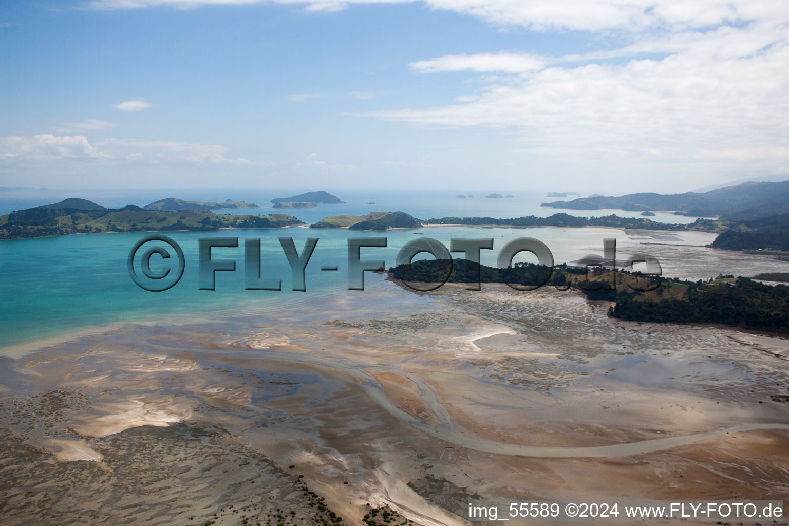 Water surface at the seaside McGregor Bay in the district Coromandel in Wyuna Bay in Waikato, New Zealand