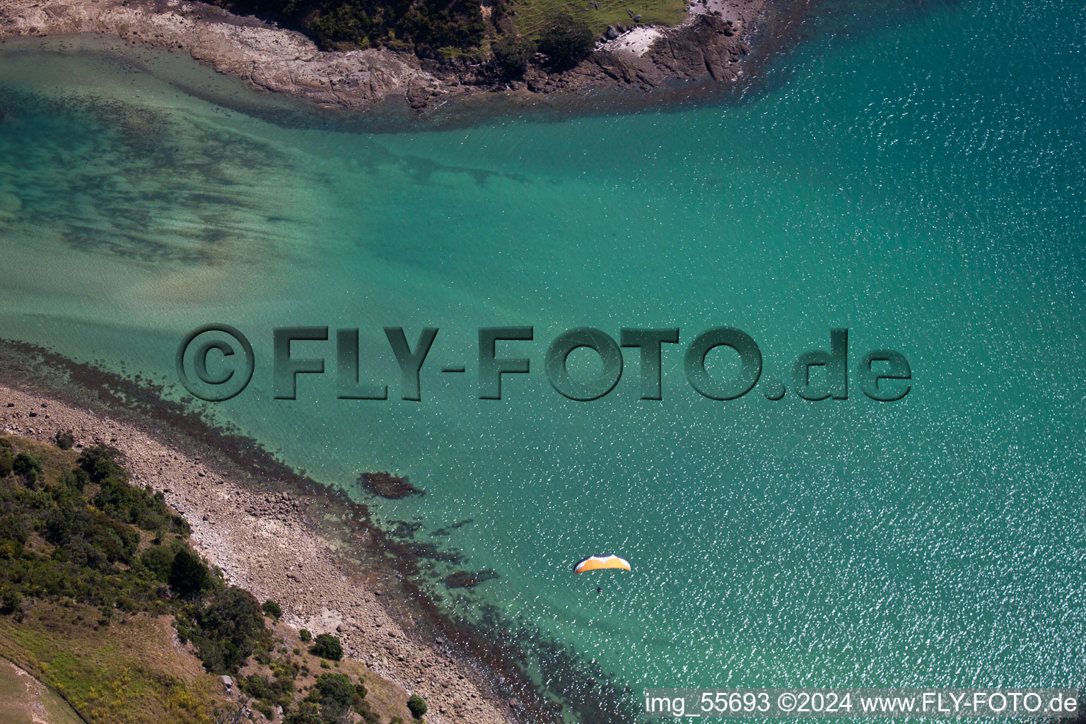 Aerial view of Water surface at the seaside McGregor Bay in the district Coromandel in Wyuna Bay in Waikato, New Zealand