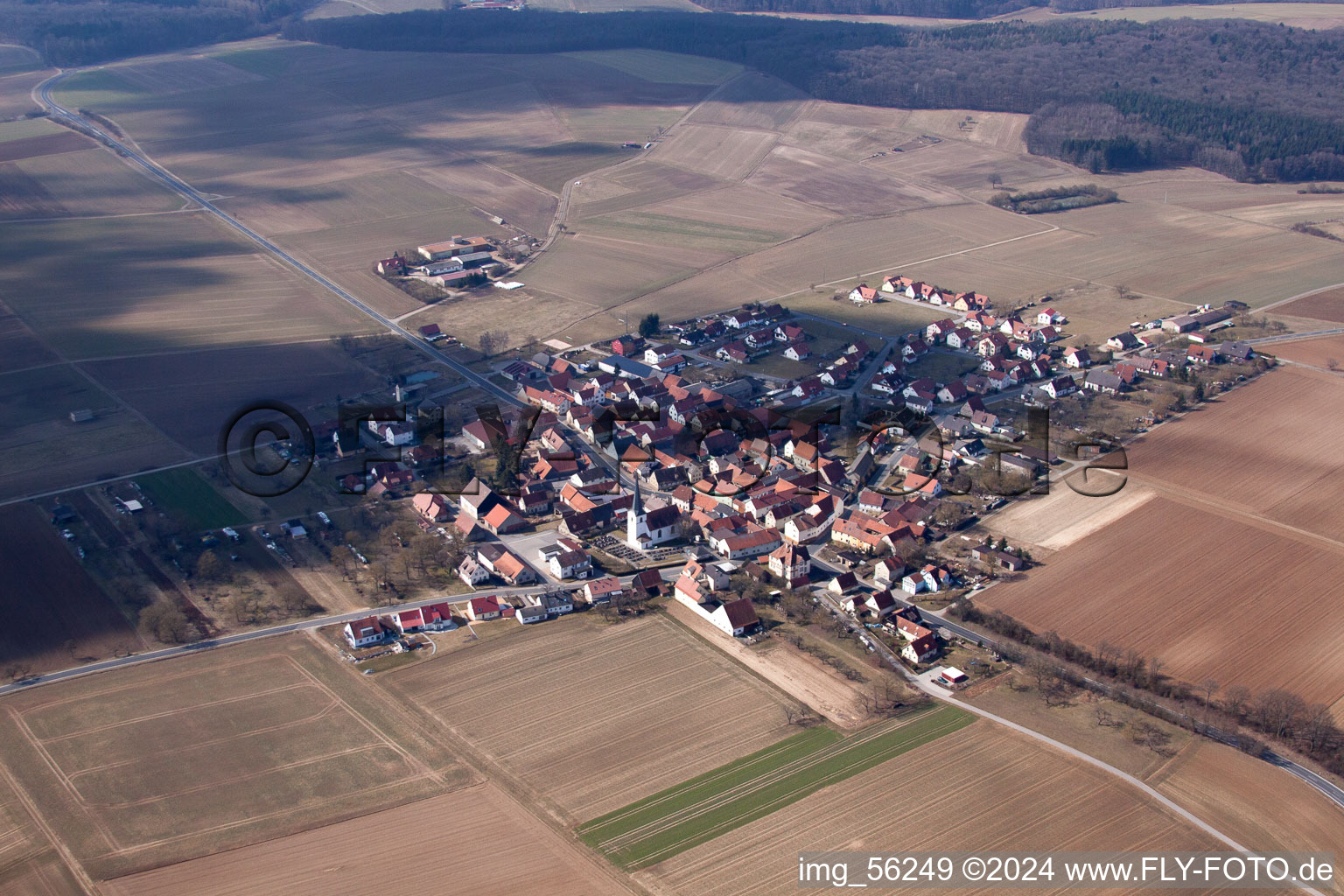 Village - view on the edge of agricultural fields and farmland in Ebertshausen in the state Bavaria out of the air