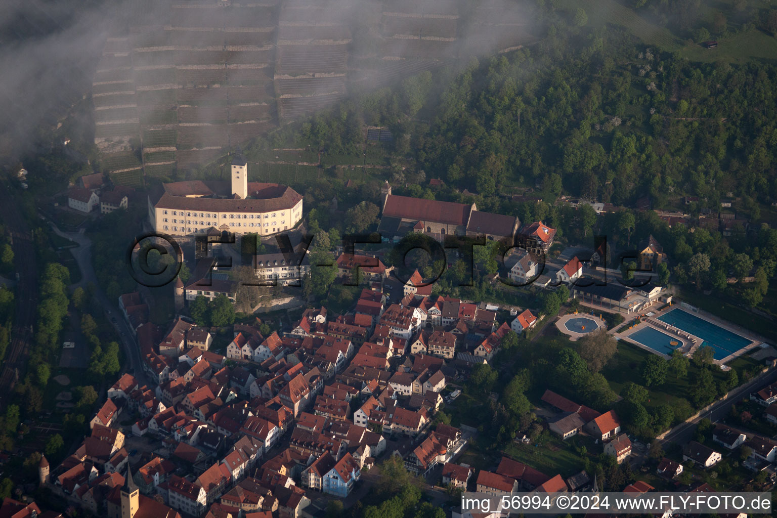 Castle of Schloss Horneck between clouds in Gundelsheim in the state Baden-Wurttemberg