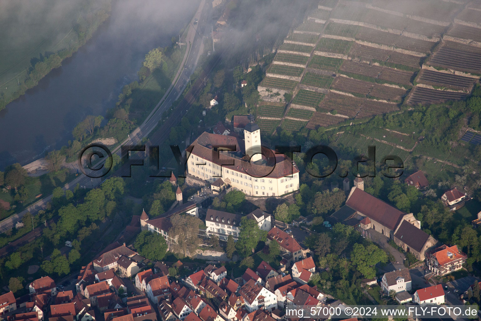 Aerial photograpy of Castle of Schloss Horneck between clouds in Gundelsheim in the state Baden-Wurttemberg