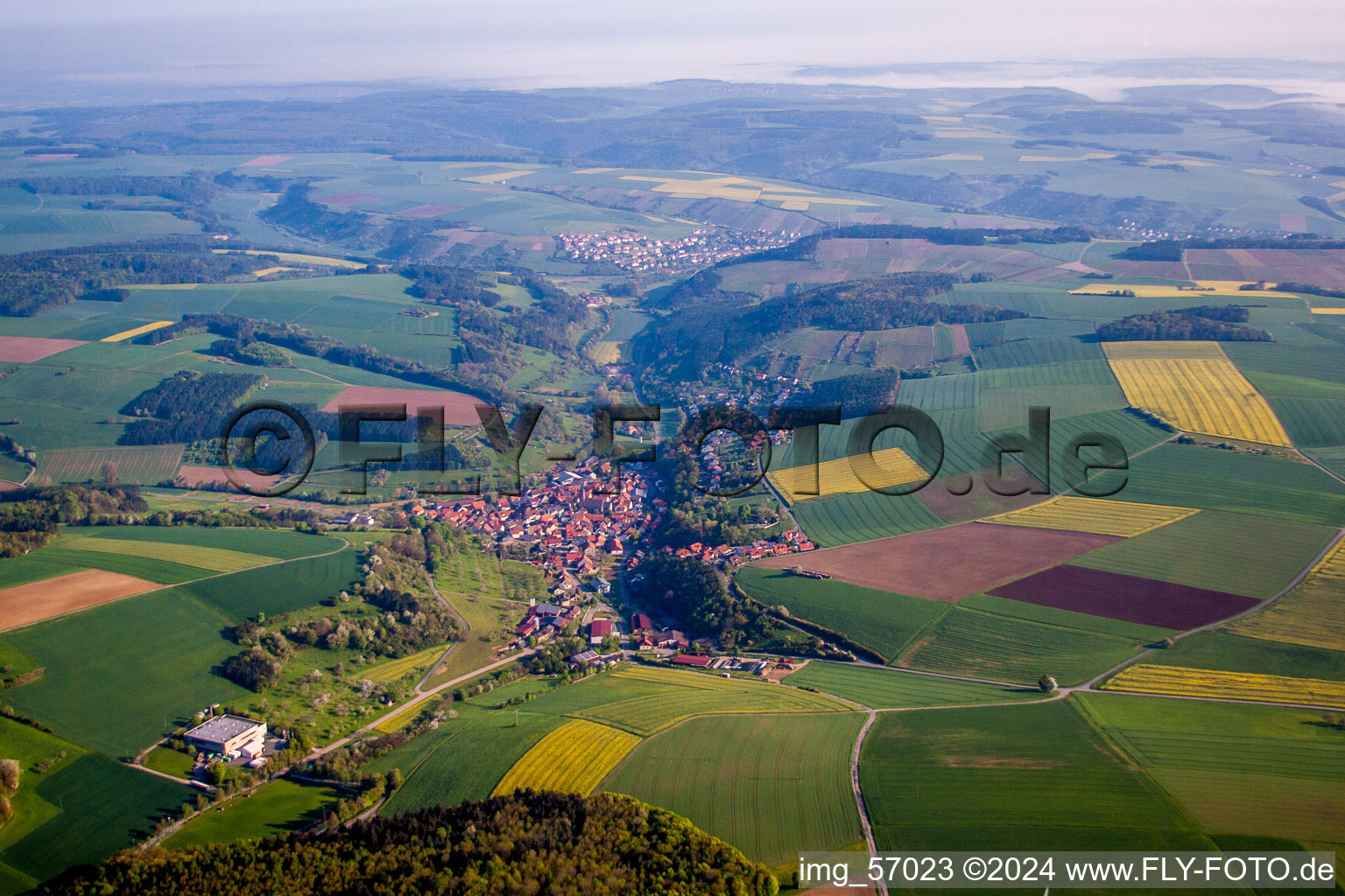 Village - view on the edge of agricultural fields and farmland in the district Gissigheim in Koenigheim in the state Baden-Wurttemberg, Germany