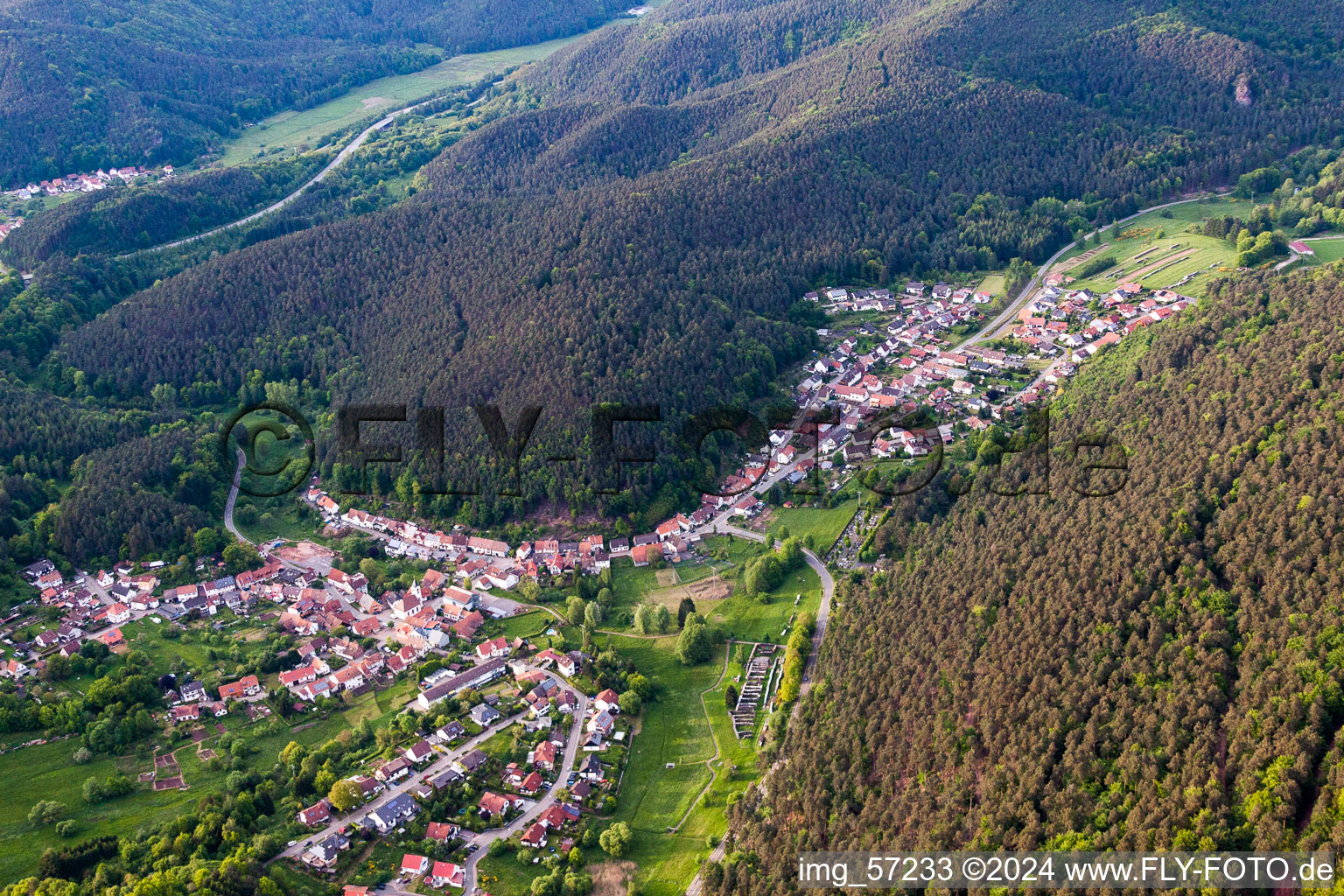 Aerial view of Village - view on the edge of agricultural fields and farmland in Spirkelbach in the state Rhineland-Palatinate, Germany