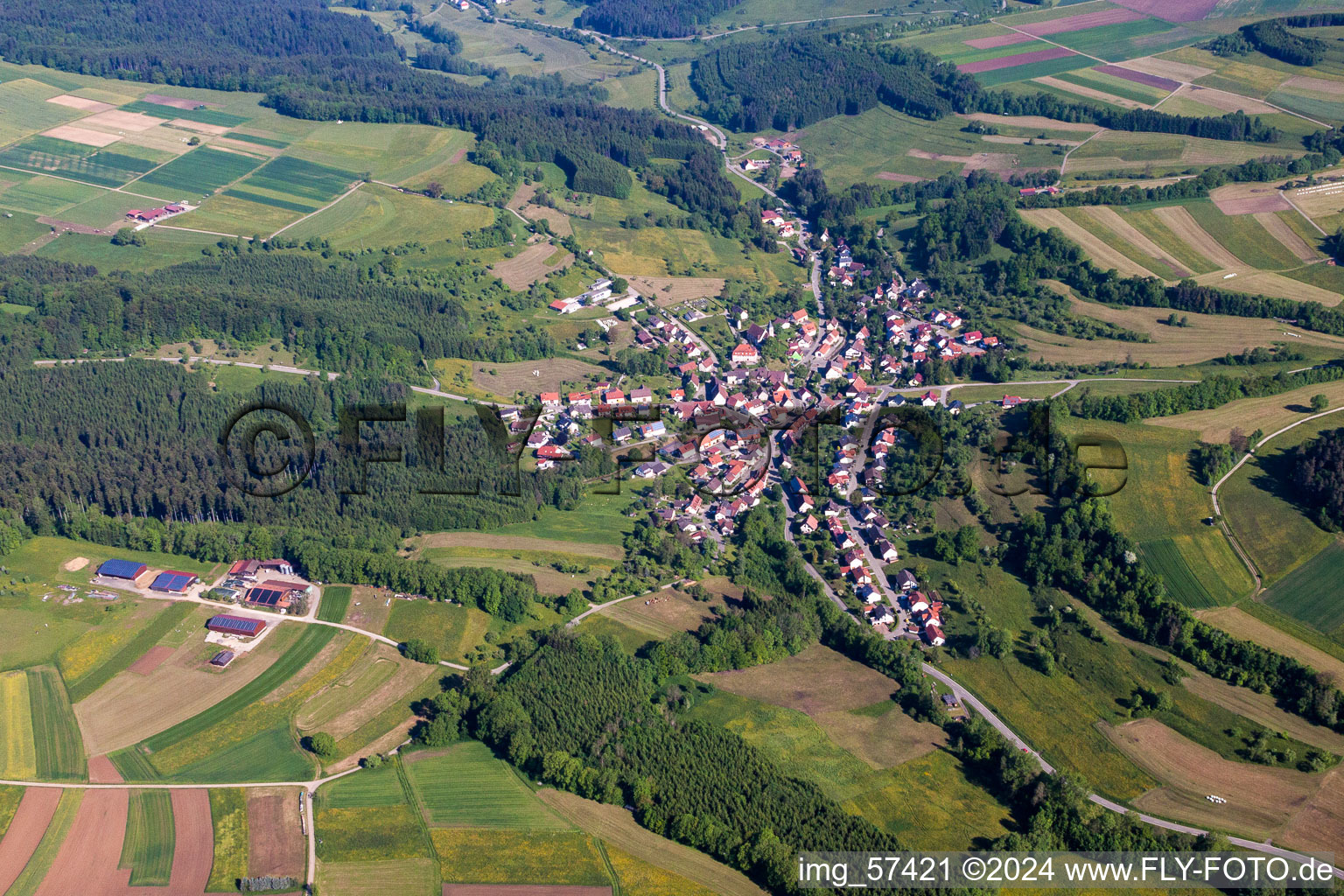 Village - view on the edge of agricultural fields and farmland in Zimmern unter der Burg in the state Baden-Wurttemberg, Germany