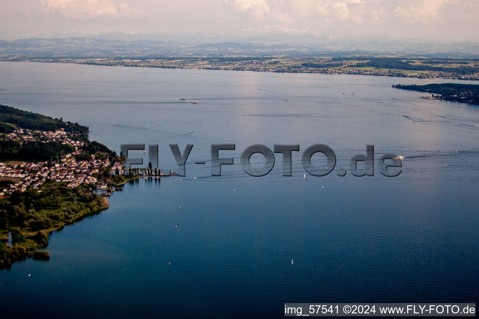 Aerial view of Museum building ensemble Pfahlbauten Unteruhldingen in the lake of Constance in Uhldingen-Muehlhofen in the state Baden-Wurttemberg, Germany