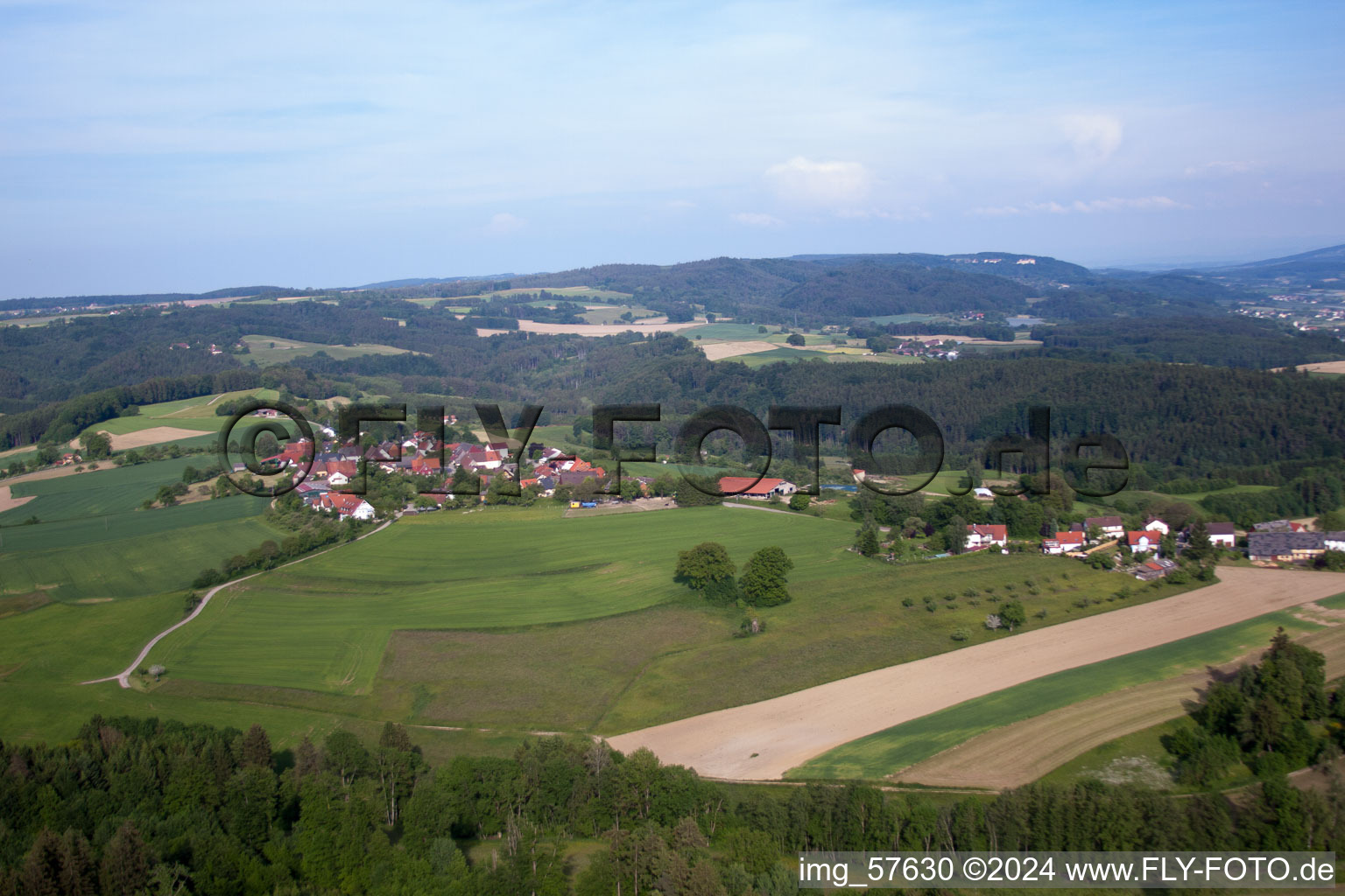 Village - view on the edge of agricultural fields and farmland in Herdwangen-Schoenach in the state Baden-Wurttemberg, Germany from above