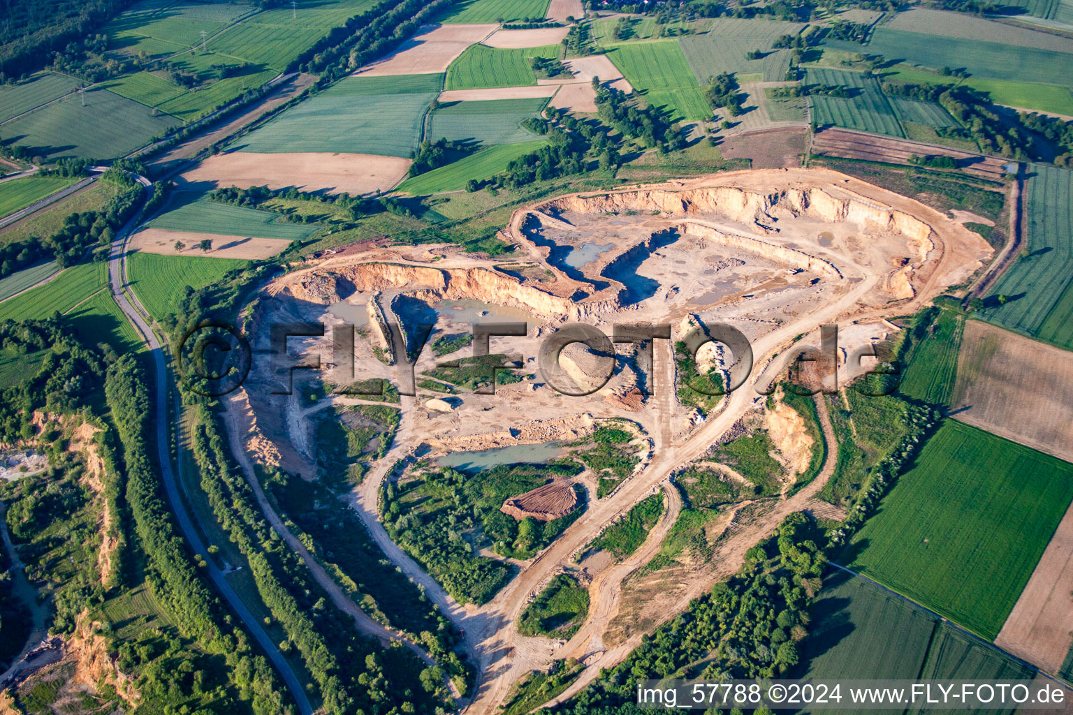 Aerial view of Site and Terrain of overburden surfaces Cement opencast mining Steinbruch Walzbachtal in Walzbachtal in the state Baden-Wurttemberg, Germany