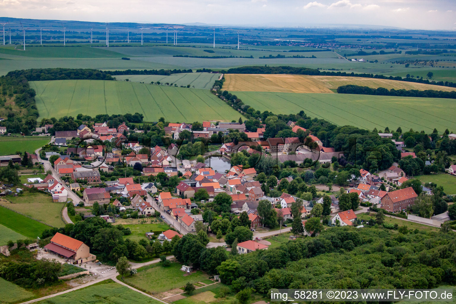 Village - view on the edge of agricultural fields and farmland in Heteborn in the state Saxony-Anhalt, Germany