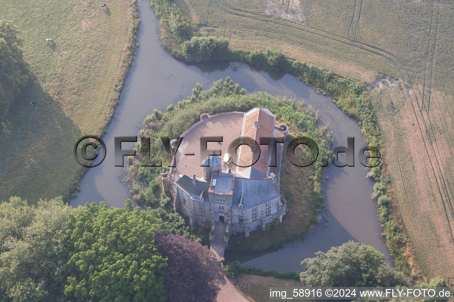 Aerial view of Building and castle park systems of water castle von Tilques in Tilques in Hauts-de-France, France