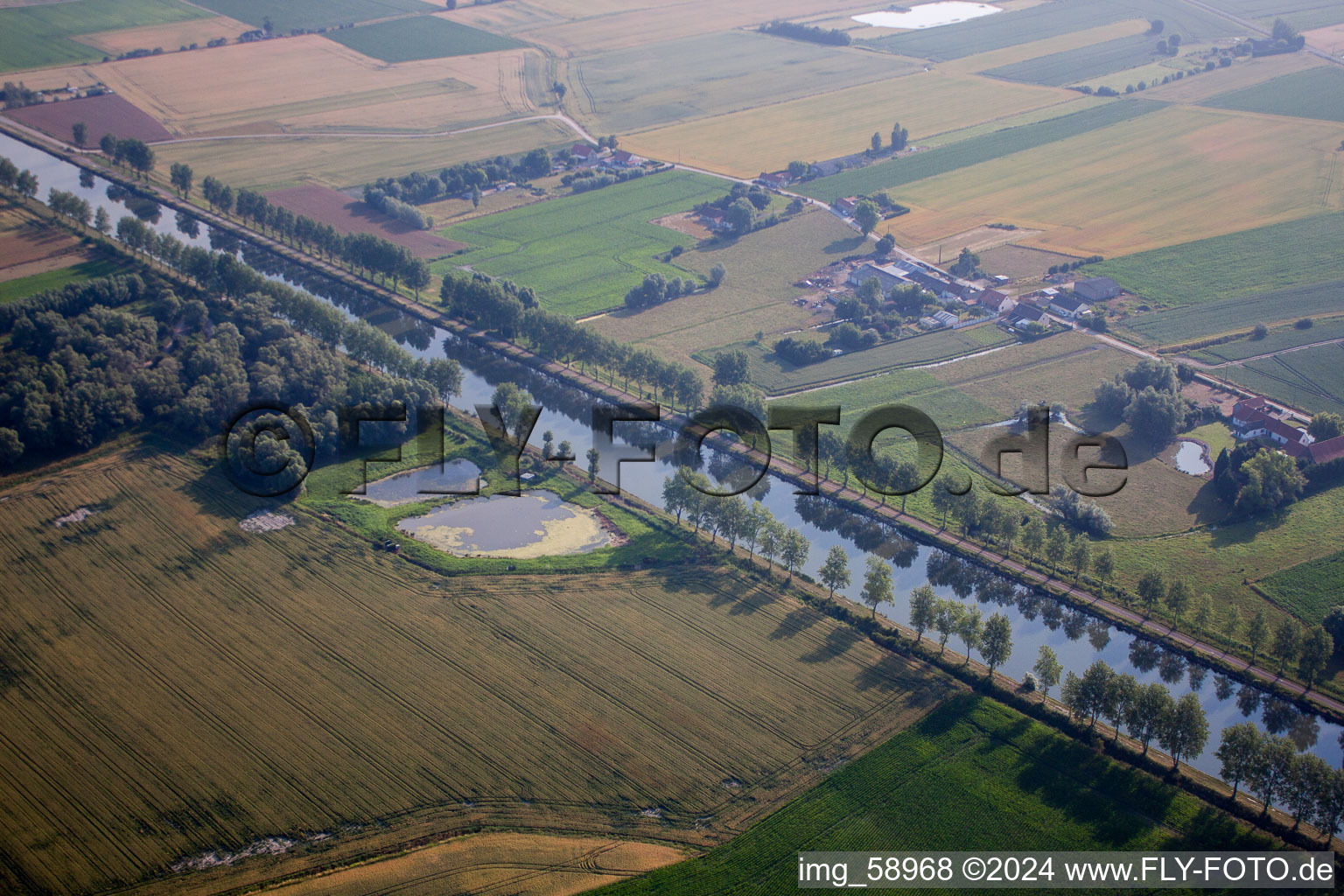 Channel flow and river banks of the waterway shipping Canal de la Haute Colme in Lille in Nord-Pas-de-Calais Picardy, France