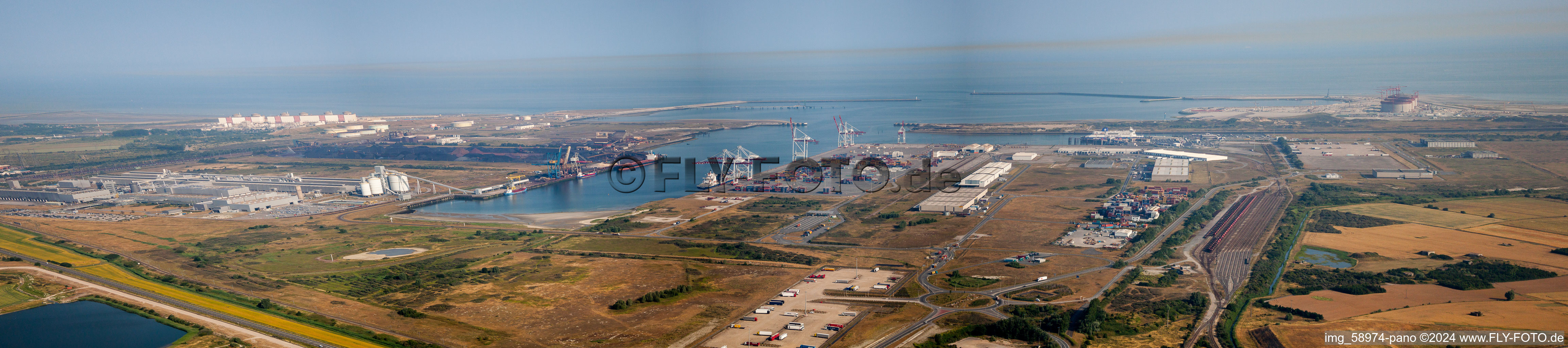 Panoramic view of the Port facilities on the seashore of the Channel-ferry port Dunkerque in Loon-Plage in Hauts-de-France, France