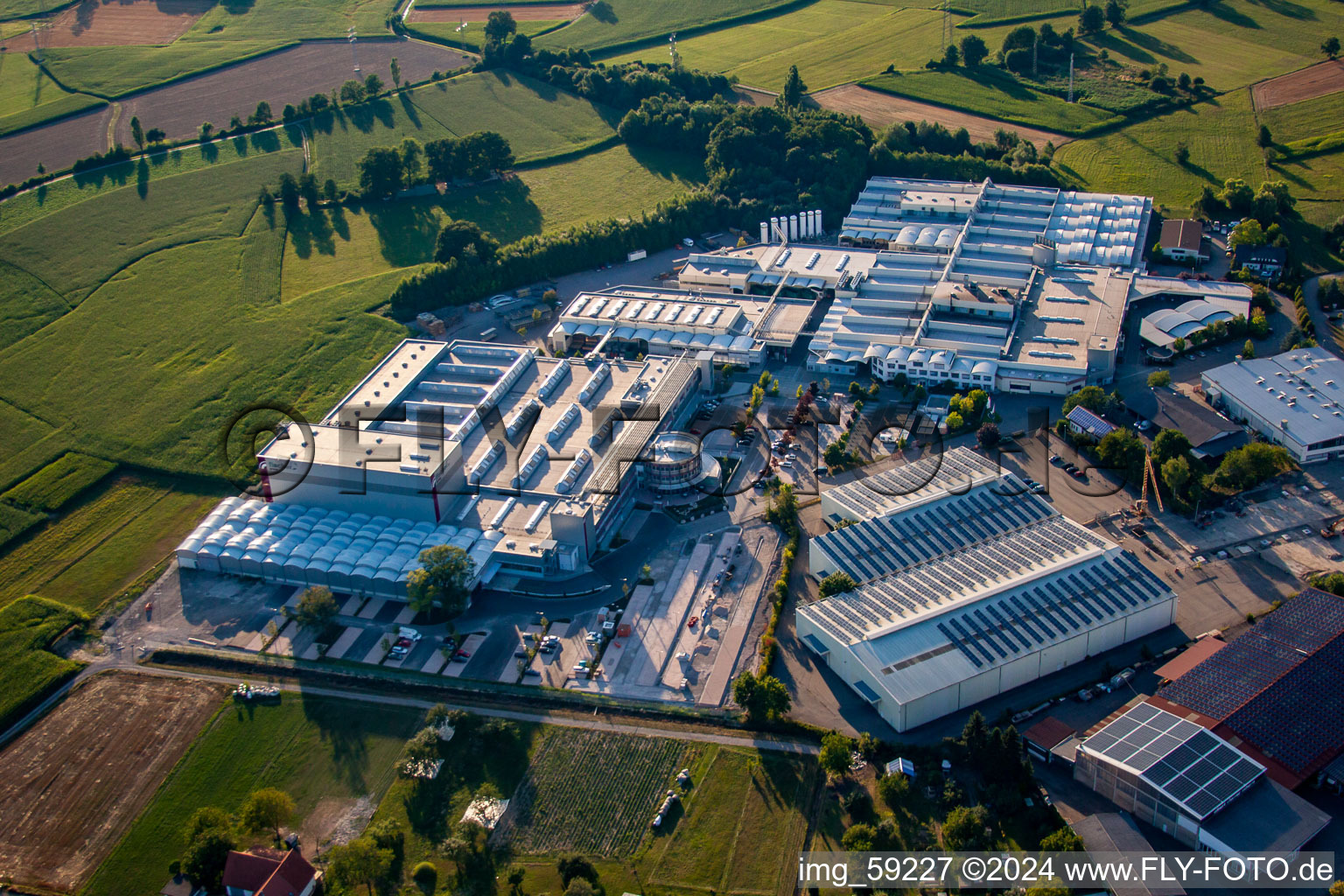 Aerial view of Industrial and commercial area of Fischer Edelstahlrohre GmbH in Achern in the state Baden-Wurttemberg, Germany