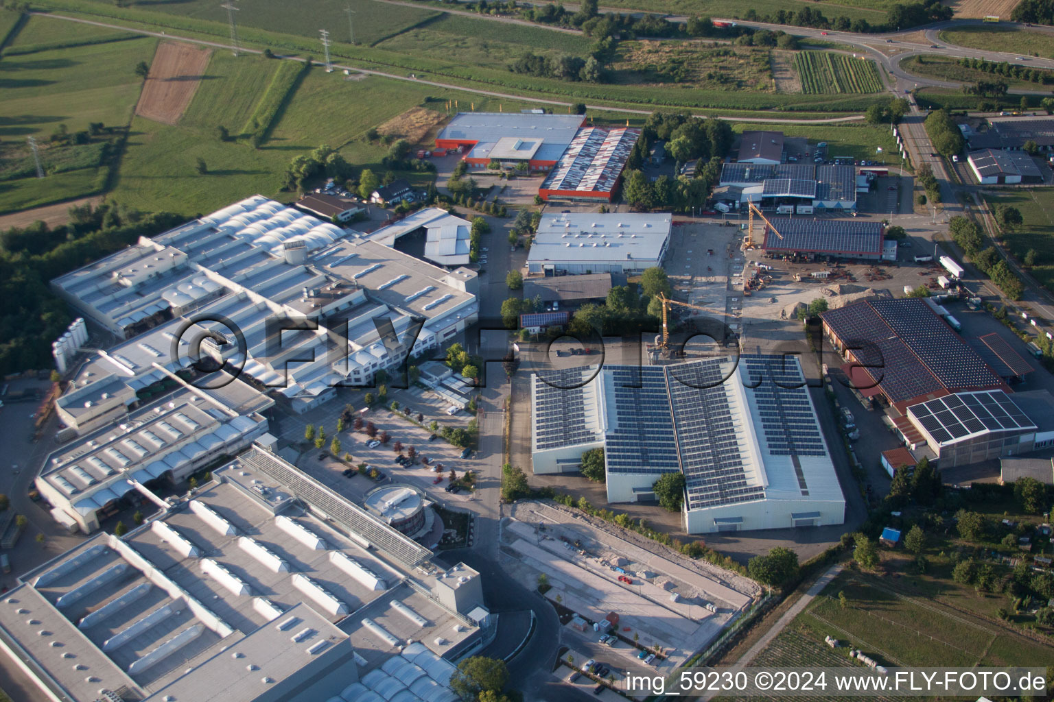 Oblique view of Industrial and commercial area of Fischer Edelstahlrohre GmbH in Achern in the state Baden-Wurttemberg, Germany