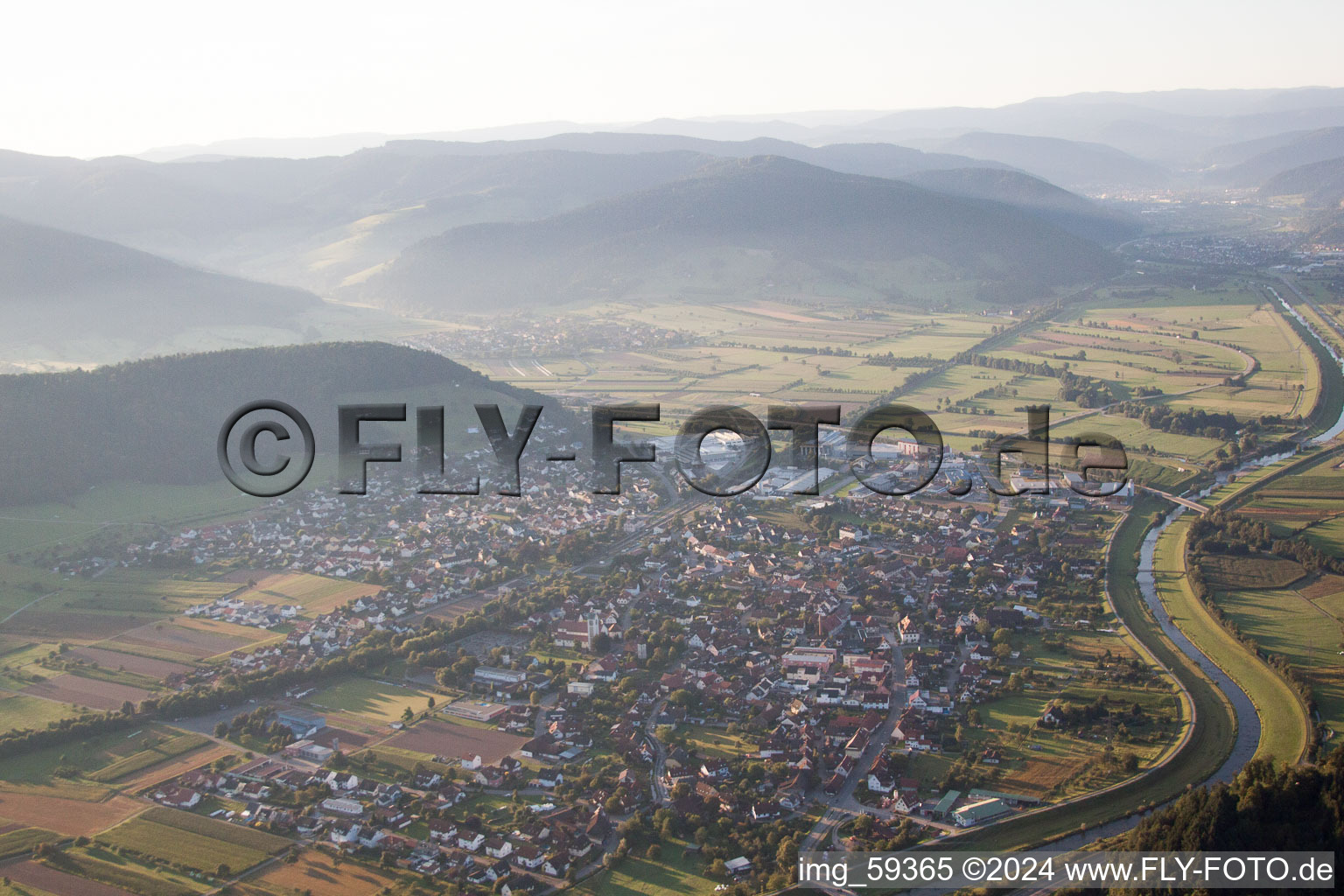 Aerial view of Village on the banks of the area Kinzig - river course in Biberach in the state Baden-Wurttemberg